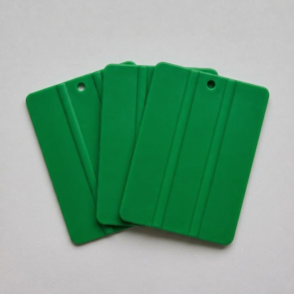 pack de 3 espátulas plásticas flexibles verdes para vinilo adhesivo.