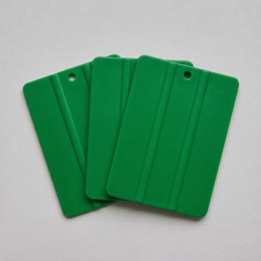 pack de 3 espátulas plásticas flexibles verdes para vinilo adhesivo.